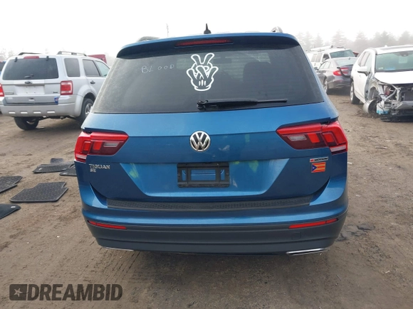 2019 Volkswagen Tiguan SE with VIN 3VV2B7AX4KM017280, listed as a IAAI auction lot 41786487 with 119,949 mi miles and . Bid and sale history available at DreamBid. Image 16.