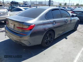2021 BMW 3 Series 330e with VIN 3MW5P7J06M8C15108, listed as a IAAI auction lot 41885084 with 1 mi miles. Bid and sale history available at carsss.com. Image 4.