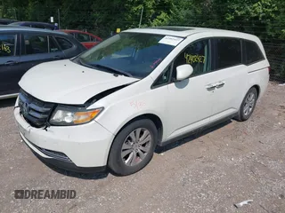 2014 Honda Odyssey EX-L with VIN 5FNRL5H63EB131596, listed as a IAAI auction lot 42402427 with 106,156 mi miles and . Bid and sale history available at DreamBid. Image 18.