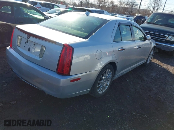 2010 Cadillac STS AWD with VIN 1G6DU6EV8A0120484, listed as a IAAI auction lot 41528974 with 89,489 mi miles and . Bid and sale history available at carsss.com. Image 4.