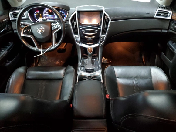2014 Cadillac SRX Performance Collection z VIN 3GYFNFE31ES627978, wystawiony jako Copart lot #55437185 z przebiegiem 141 759 mil mil oraz Czysty tytuł • Clean title. Historia ofert i sprzedaży dostępna na DreamBid. Obrazek 8.