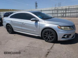 2013 Volkswagen CC Sport Plus z VIN WVWBP7AN2DE558965, wystawiony jako Copart lot #52894795 z przebiegiem 171 734 mil mil oraz Szkoda całkowita • Salvage title. Historia ofert i sprzedaży dostępna na DreamBid. Obrazek 4.