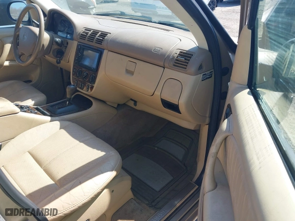 2001 Mercedes-Benz M-Class with VIN 4JGAB54E71A245256, listed as a IAAI auction lot 41697960 with 191,911 mi miles. Bid and sale history available at carsss.com. Image 5.