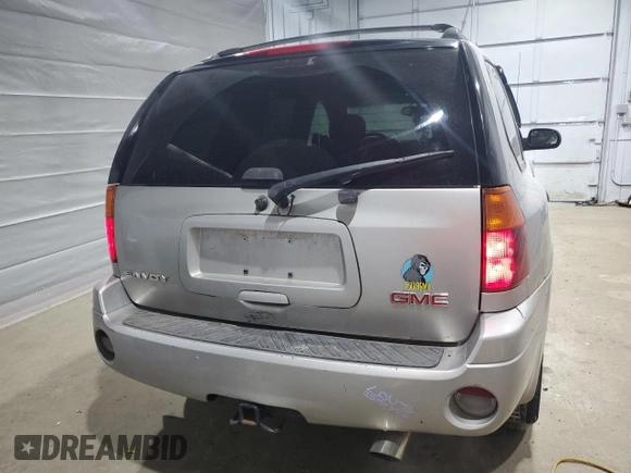 2006 GMC Envoy SLE z VIN 1GKDT13S162314222, wystawiony jako Copart lot #47171135 z przebiegiem 120 677 mil mil oraz Szkoda całkowita • Salvage title. Historia ofert i sprzedaży dostępna na DreamBid. Obrazek 6.