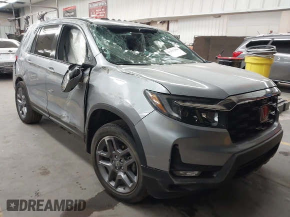 2023 Honda Passport EX-L with VIN 5FNYF8H56PB025612, listed as a IAAI auction lot 41937956 with 31,065 mi miles and . Bid and sale history available at DreamBid. Image 1.