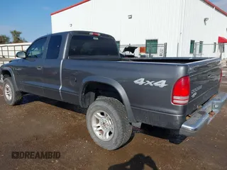 2004 Dodge Dakota SLT with VIN 1D7HG42N44S618405, listed as a IAAI auction lot 40895893 with 172,324 mi miles. Bid and sale history available at carsss.com. Image 3.