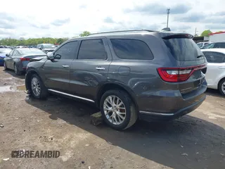 2014 Dodge Durango Citadel with VIN 1C4RDJEG7EC493379, listed as a IAAI auction lot 42159732 with 184,373 mi miles and . Bid and sale history available at DreamBid. Image 3.