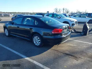 2015 Volkswagen Passat 1.8T Wolfsburg Ed with VIN 1VWAT7A34FC004649, listed as a IAAI auction lot 41728398 with 91,651 mi miles. Bid and sale history available at carsss.com. Image 3.