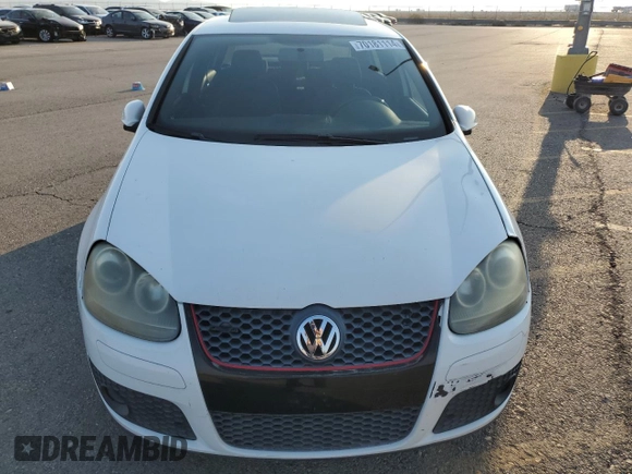 2009 Volkswagen GTI z VIN WVWHV71K89W101309, wystawiony jako Copart lot #70181114 z przebiegiem 121 728 mil mil oraz Szkoda całkowita • Salvage title. Historia ofert i sprzedaży dostępna na DreamBid. Obrazek 5.