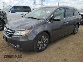2015 Honda Odyssey Touring Elite с VIN 5FNRL5H96FB047204, выставлен на аукционе Copart как лот 56297985 с пробегом 125 482 миль миль и Списание • Salvage title. История ставок и продаж доступна на DreamBid. Изображение 1.