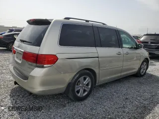 2008 Honda Odyssey Touring z VIN 5FNRL38978B062320, wystawiony jako Copart lot #59898345 z przebiegiem 229 760 mil mil oraz Czysty tytuł • Clean title. Historia ofert i sprzedaży dostępna na DreamBid. Obrazek 3.