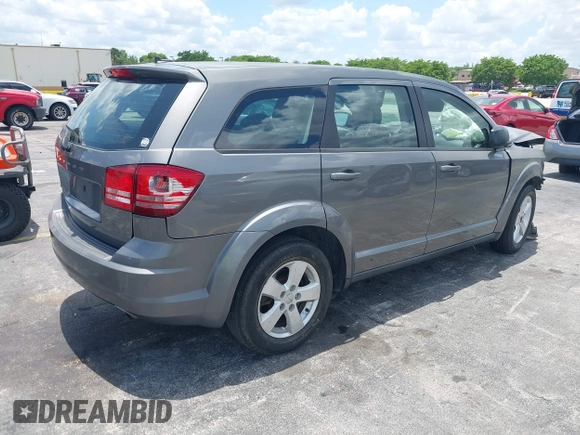 2013 Dodge Journey SE with VIN 3C4PDCAB3DT626929, listed as a IAAI auction lot 42318702 with Not provided miles and . Bid and sale history available at DreamBid. Image 4.
