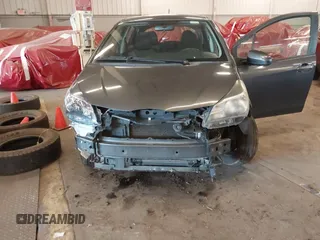 2015 Toyota Yaris L with VIN VNKKTUD36FA049550, listed as a IAAI auction lot 41671226 with 129,540 mi miles. Bid and sale history available at carsss.com. Image 6.