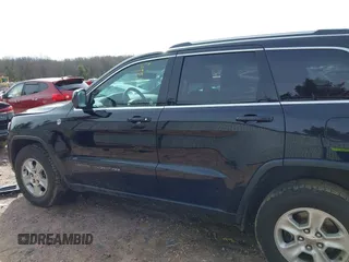 2017 Jeep Grand Cherokee Laredo with VIN 1C4RJFAGXHC863904, listed as a IAAI auction lot 41914465 with 122,981 mi miles. Bid and sale history available at carsss.com. Image 14.