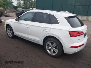 2018 Audi Q5 Premium Plus z VIN WA1BNAFY6J2214696, wystawiony jako IAAI lot #42350132 z przebiegiem 54 550 mil mil oraz . Historia ofert i sprzedaży dostępna na DreamBid. Obrazek 3.