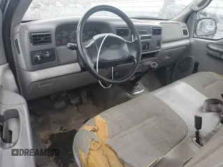 1999 Ford Super Duty F-250 XL with VIN 1FTNF20L0XEA51389, listed as a Copart auction lot 52618635 with 198,767 mi miles and Salvage Title. Bid and sale history available at carsss.com. Image 8.