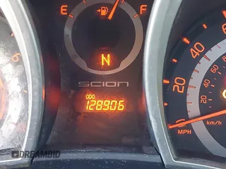 2015 Scion tC with VIN JTKJF5C79FJ003404, listed as a IAAI auction lot 41756024 with 128,906 mi miles. Bid and sale history available at carsss.com. Image 15.