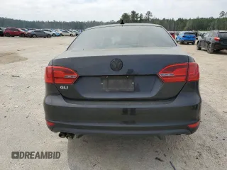 2013 Volkswagen Jetta GLI z VIN 3VW467AJ4DM211007, wystawiony jako Copart lot #48052105 z przebiegiem Nie podano mil oraz Szkoda całkowita • Salvage title. Historia ofert i sprzedaży dostępna na DreamBid. Obrazek 6.