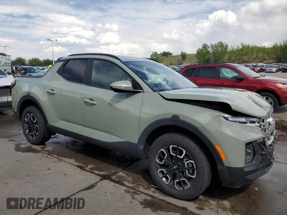 2022 Hyundai Santa Cruz SEL Premium z VIN 5NTJDDAF5NH016841, wystawiony jako Copart lot #58422695 z przebiegiem 27 287 mil mil oraz Szkoda całkowita • Salvage title. Historia ofert i sprzedaży dostępna na DreamBid. Obrazek 4.