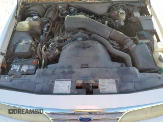 1995 Ford Crown Victoria z VIN 2FALP73W7SX158296, wystawiony jako Copart lot #56706735 z przebiegiem 104 884 mil mil oraz Czysty tytuł • Clean title. Historia ofert i sprzedaży dostępna na DreamBid. Obrazek 11.