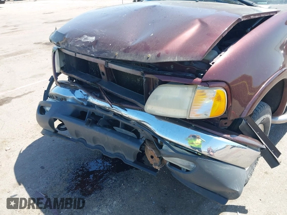 2000 Ford F-150 XL with VIN 1FTRX18L5YNA99713, listed as a IAAI auction lot 42194838 with Not provided miles and . Bid and sale history available at DreamBid. Image 12.