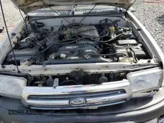 1999 Toyota 4Runner Limited with VIN JT3GN87R5X0115971, listed as a Copart auction lot 50742105 with 323,635 mi miles and Salvage Title. Bid and sale history available at DreamBid. Image 12.