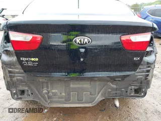 2013 Kia Rio EX with VIN KNADN4A3XD6239977, listed as a IAAI auction lot 42265924 with 117,114 mi miles and . Bid and sale history available at DreamBid. Image 6.