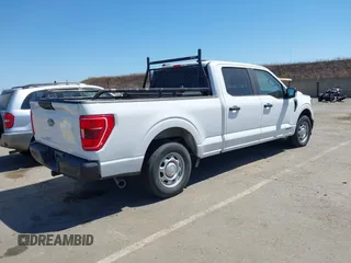 2021 Ford F-150 XL with VIN 1FTFW1CD1MFB31373, listed as a IAAI auction lot 42530409 with 119,956 mi miles and . Bid and sale history available at DreamBid. Image 4.