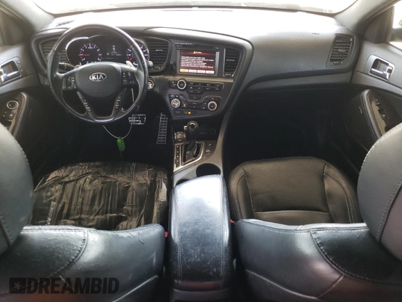 2013 Kia Optima SX с VIN 5XXGR4A65DG190896, выставлен на аукционе Copart как лот 59630485 с пробегом 136 385 миль миль и Списание • Salvage title. История ставок и продаж доступна на DreamBid. Изображение 8.