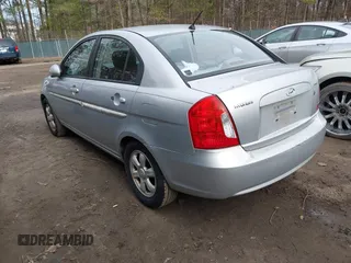 2006 Hyundai Accent GLS with VIN KMHCN46C46U012561, listed as a IAAI auction lot 41750609 with 286,770 mi miles. Bid and sale history available at carsss.com. Image 3.