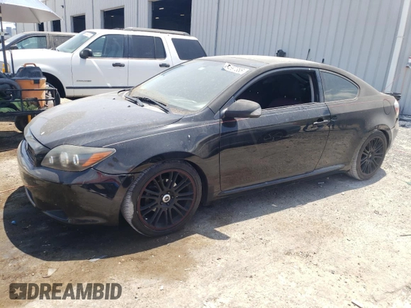 2009 Scion tC with VIN JTKDE167390302286, listed as a Copart auction lot 54697385 with 155,519 mi miles and Salvage Title. Bid and sale history available at carsss.com. Image 1.