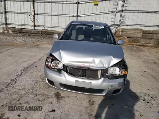 2009 Kia Spectra LX with VIN KNAFE221895659552, listed as a Copart auction lot 82555924 with 114,704 mi miles and Salvage Title. Bid and sale history available at carsss.com. Image 10.