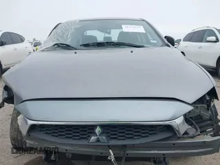 2017 Mitsubishi Lancer ES with VIN JA32U2FU0HU005625, listed as a IAAI auction lot 41378115 with 119,533 mi miles. Bid and sale history available at carsss.com. Image 13.