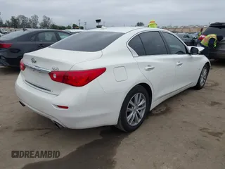 2015 Infiniti Q50 Premium z VIN JN1BV7AP2FM344044, wystawiony jako IAAI lot #42217012 z przebiegiem 155 714 mil mil oraz . Historia ofert i sprzedaży dostępna na DreamBid. Obrazek 4.
