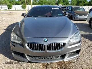 2014 BMW 6 Series 650i xDrive z VIN WBA6B4C53ED371461, wystawiony jako Copart lot #51136055 z przebiegiem 143 213 mil mil oraz Tytuł czysty. Historia ofert i sprzedaży dostępna na DreamBid. Obrazek 5.