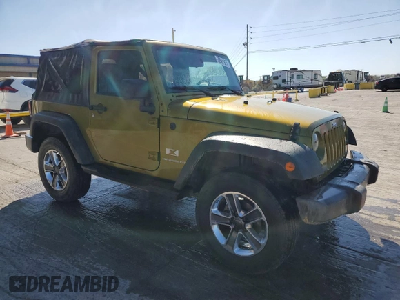 2008 Jeep Wrangler X with VIN 1J4FA24168L609202, listed as a Copart auction lot 52901975 with 165,083 mi miles and Salvage Title. Bid and sale history available at DreamBid. Image 4.