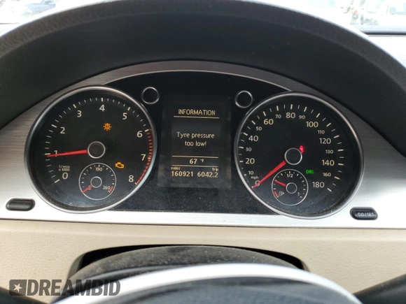 2010 Volkswagen CC Luxury z VIN WVWHP7AN9AE535737, wystawiony jako Copart lot #77401854 z przebiegiem 160 921 mil mil oraz Szkoda całkowita • Salvage title. Historia ofert i sprzedaży dostępna na DreamBid. Obrazek 9.