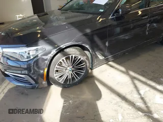 2018 BMW 5 Series 530i xDrive with VIN WBAJA7C55JWA73459, listed as a IAAI auction lot 41634921 with 64,759 mi miles and . Bid and sale history available at carsss.com. Image 6.