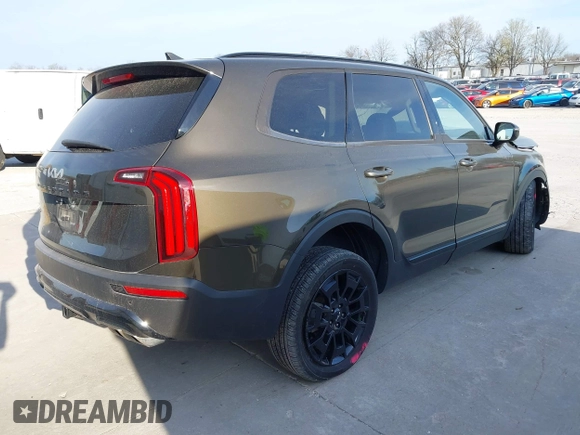2022 Kia Telluride SX with VIN 5XYP5DHC2NG294489, listed as a IAAI auction lot 41898817 with 12,521 mi miles and . Bid and sale history available at DreamBid. Image 4.