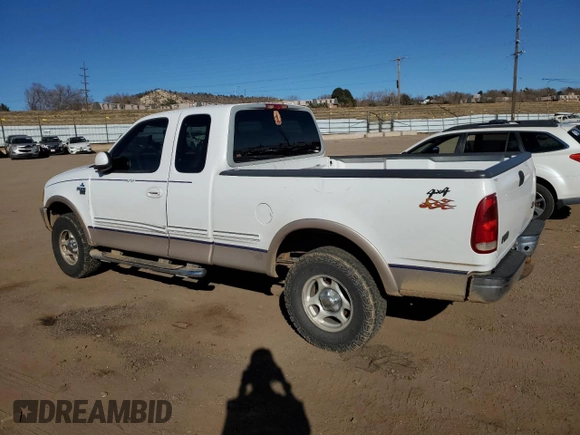 1998 Ford F-150 with VIN 1FTZX18W3WNA25682, listed as a Copart auction lot 47494755 with 197,389 mi miles and Salvage title. Bid and sale history available at DreamBid. Image 2.