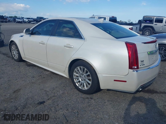 2010 Cadillac CTS Luxury with VIN 1G6DE5EG9A0118042, listed as a IAAI auction lot 42448076 with 142,359 mi miles and . Bid and sale history available at DreamBid. Image 3.