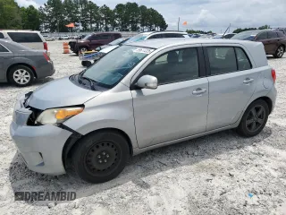 2013 Scion xD with VIN JTKKUPB41D1038562, listed as a Copart auction lot 59677225 with 125,503 mi miles and Salvage title. Bid and sale history available at DreamBid. Image 1.