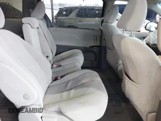2014 Toyota Sienna LE AAS with VIN 5TDKK3DC7ES426751, listed as a IAAI auction lot 41975870 with 100,000 mi miles and . Bid and sale history available at carsss.com. Image 8.