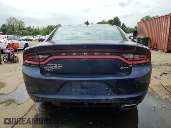 2015 Dodge Charger SXT with VIN 2C3CDXJG7FH848665, listed as a Copart auction lot 66849085 with 88,023 mi miles and Salvage title. Bid and sale history available at DreamBid. Image 6.