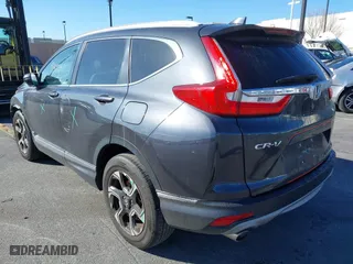 2019 Honda CR-V Touring with VIN 7FARW1H92KE014019, listed as a IAAI auction lot 41691555 with 32,635 mi miles. Bid and sale history available at carsss.com. Image 3.
