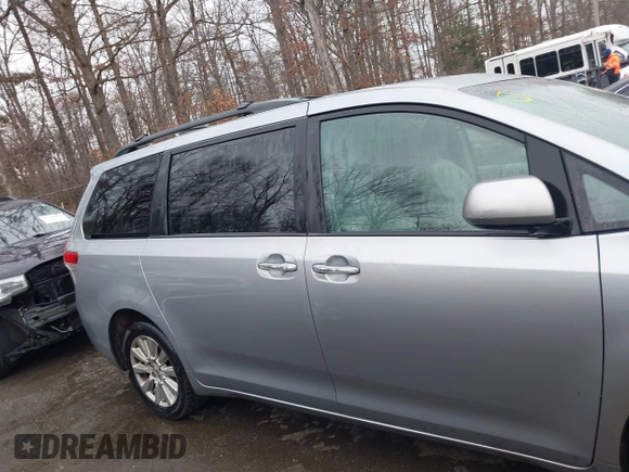 2013 Toyota Sienna XLE with VIN 5TDDK3DC5DS070243, listed as a IAAI auction lot 41162661 with 149,672 mi miles and . Bid and sale history available at DreamBid. Image 13.