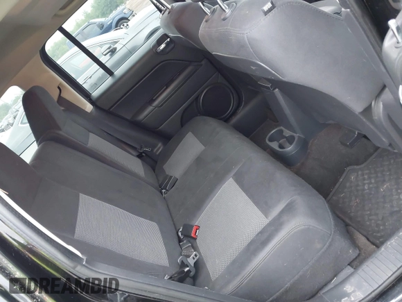 2014 Jeep Patriot Latitude with VIN 1C4NJRFB1ED501740, listed as a IAAI auction lot 42722549 with 147,974 mi miles and . Bid and sale history available at DreamBid. Image 8.