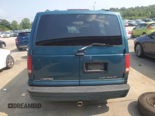 2000 Chevrolet Astro with VIN 1GNDM19W0YB196113, listed as a Copart auction lot 65641724 with 218,665 mi miles and Salvage Title. Bid and sale history available at carsss.com. Image 6.