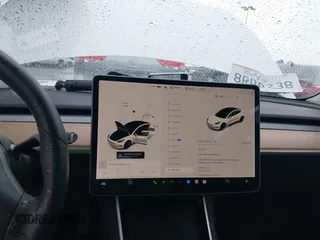 2020 Tesla Model 3 Standard Range Plus with VIN 5YJ3E1EA2LF740225, listed as a IAAI auction lot 41781554 with 46,703 mi miles. Bid and sale history available at carsss.com. Image 17.