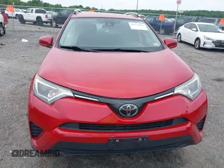 2017 Toyota RAV4 LE with VIN JTMBFREV8HJ161427, listed as a IAAI auction lot 42333851 with 121,161 mi miles and . Bid and sale history available at DreamBid. Image 12.